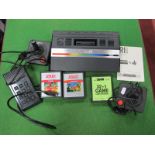 Atari 2600 Junior Gaming Console, two controllers, video touch pad, three gaming cartridges,