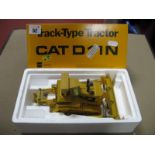A Conrad 1:50th Scale Diecast Model Cat D11N Track Type Tractor, chip to paint work noted, boxed (