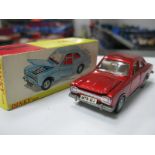 A Dinky Toys NO. 168 - Ford Escort, in metallic red, very good, boxed.