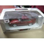 A UT Models 1:18th Scale Diecast Model Porsche 911 Turbo, metallic burgundy paint work boxed.