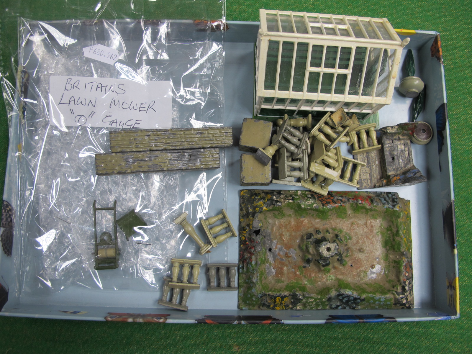 A Small Quantity of Pre-War Britains Lead Garden Items, including a lawn mower, plus a later