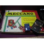 A c. 1960 Meccano Set No. 5, red and green, boxed, unchecked, playworn. Plus two clockwork motors,