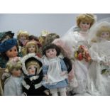 A Quantity of Porcelain Dolls, including Polly Put the Kettle On, plastic example:- Four Boxes