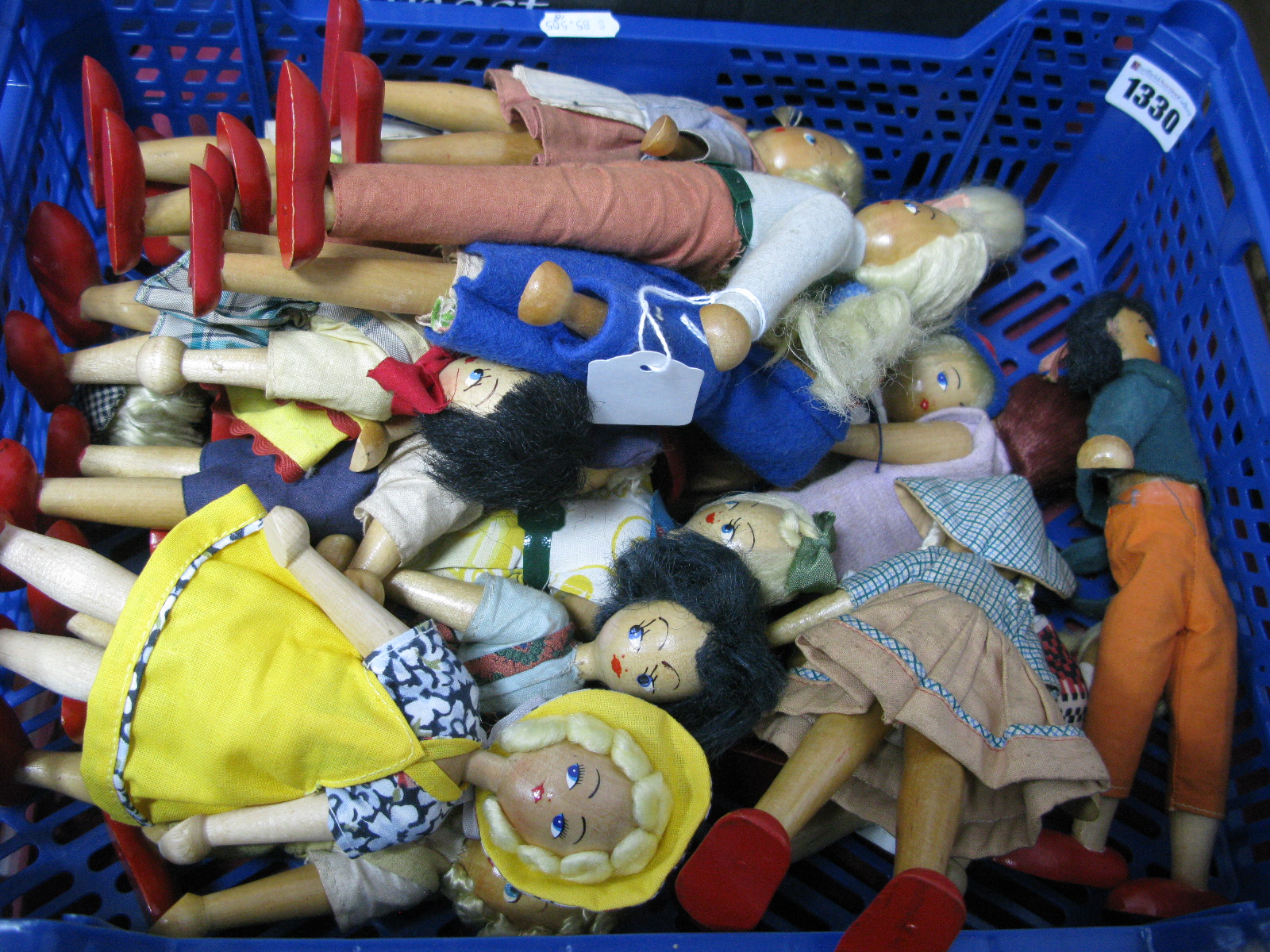 A Collection of Wooden Peg Dolls, various playworn condition. (18)