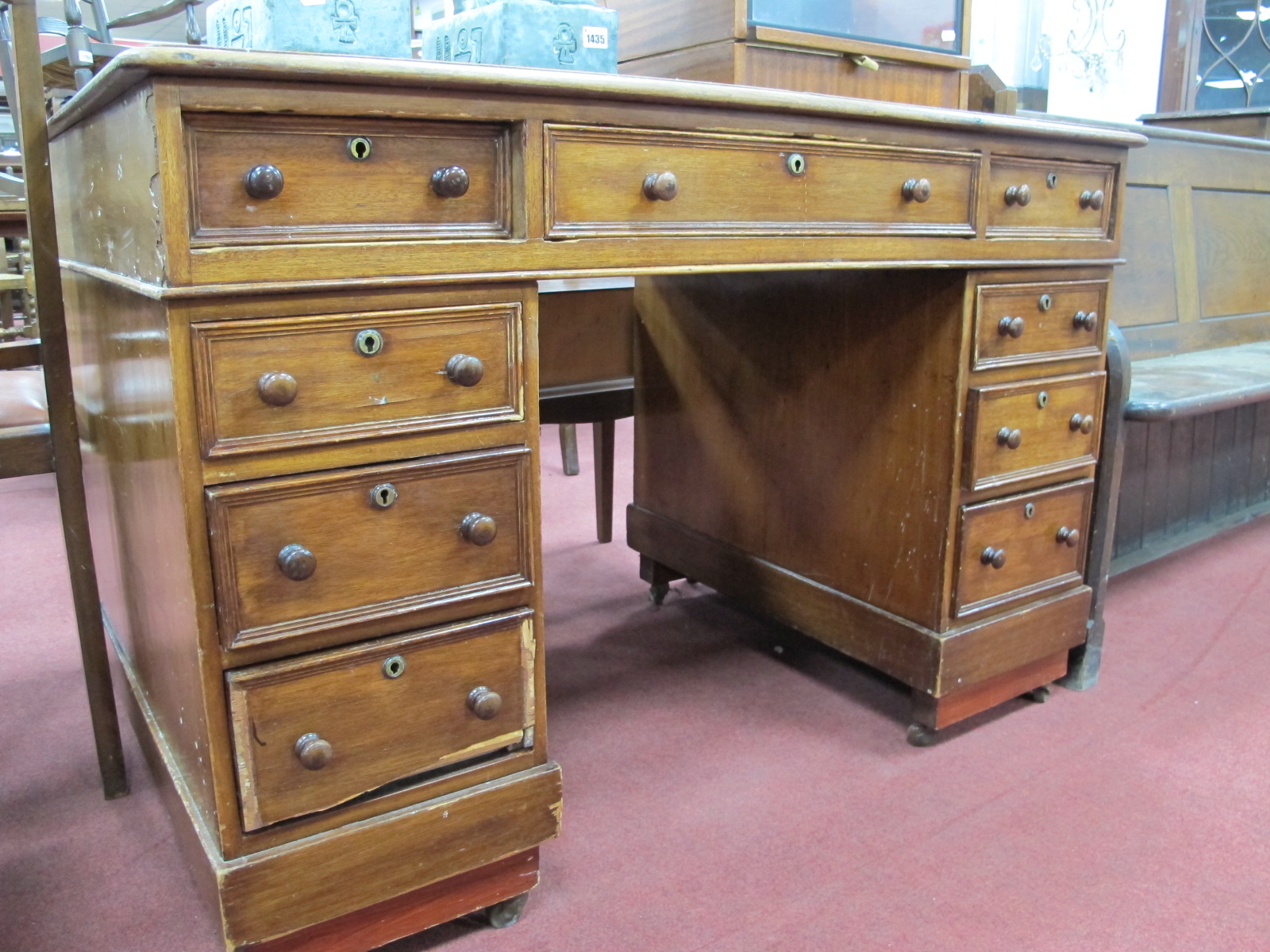 A XIX Century Mahogany Desk, with tooled inset scriver to three drawer top, on twin pedestals each