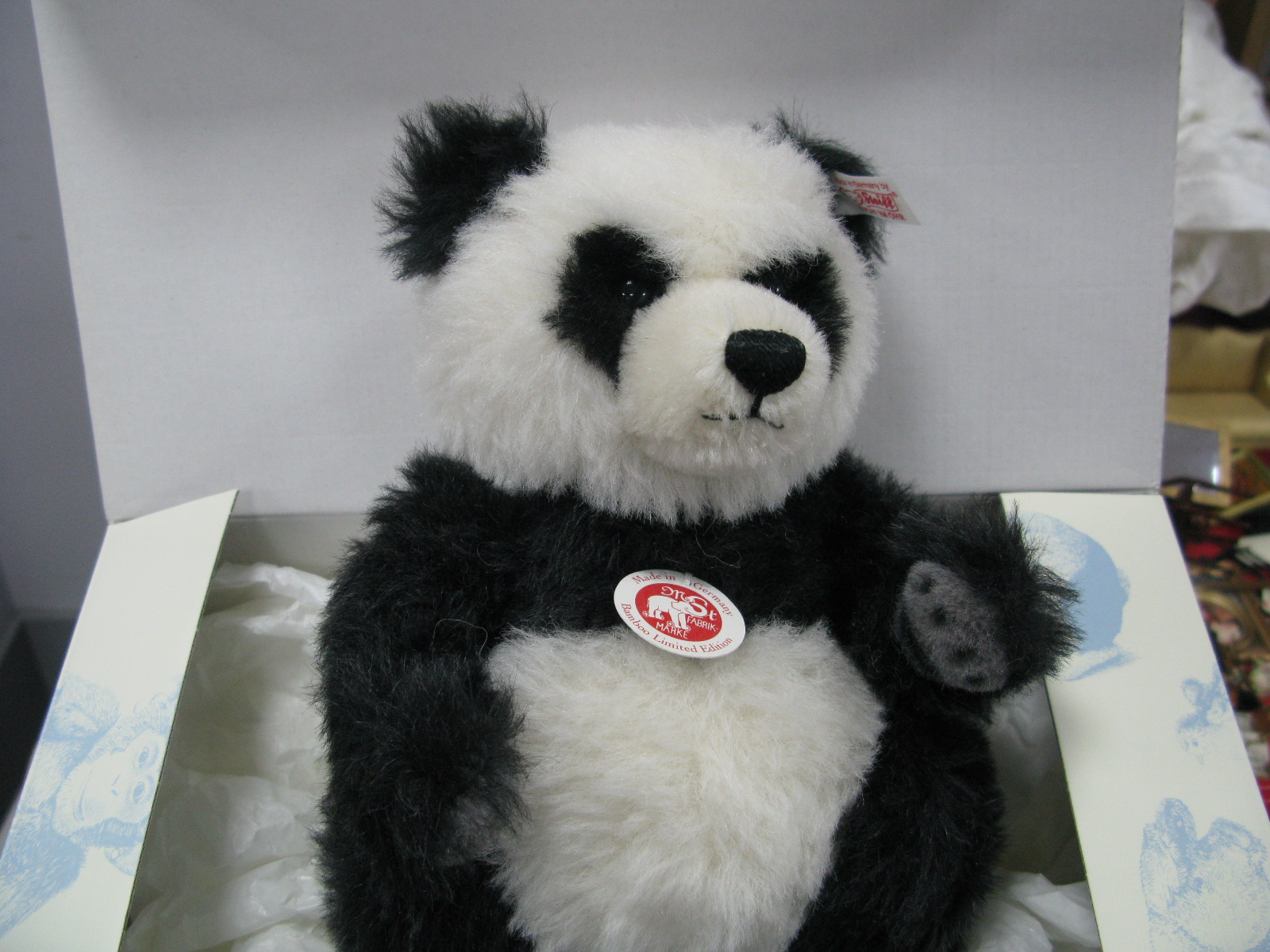 A Modern Steiff Teddy Bear Panda Bamboo, black and white, 26cm high, No. 722 of 1500, accompanied by