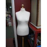 A Modern Dress Makers Style Mannequin, on tripod base.