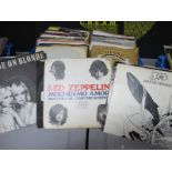 A Collection of Over Eighty 7'' Singles, to include, Led Zeppelin, David Bowie, Saxon, Blue Oyster