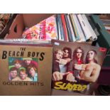 A Collection of Over Forty Five LP's, to include, Slade, The Beach Boys, The Monkees, Jethro Tull,