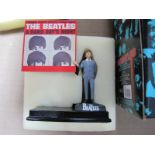 A Modern 'The Beatles'Ringo Starr Figurine, by Enesco with album cover, boxed.