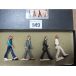 Beatles Interest: A set of four Beatles white metal figures, Abbey Road, boxed.