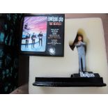 A Modern 'The Beatles' John Lennon Figurine, by Enesco with album cover, boxed.