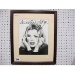 A Framed Black and White Signed Photograph of Kim Wilde, (unverified), 30.5 x 36cm.
