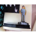 A Modern 'The Beatles' George Harrison Figurine, by Enesco, with album cover, boxed.