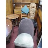 A Lloyd Loom Nursing Chair, and 1980's black coffee table and early XX Century mahogany occasional