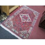 Middle Eastern Hamadan Wool Rug, allover geometric motifs on cream lozenge centre and claret ground,