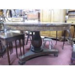 A XIX Century Mahogany Table, with a circular top, bulbous pedestal, on a trefoil base.