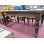 XIX Century Mahogany Wind Out Table, top with a moulded edge, on turned and reeded legs, with a