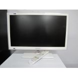 Samsung White Framed 22 4W Televison and Remote.