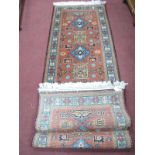 Middle Eastern Wool Tassel Runner, with six blue and five green central motifs on beige ground,