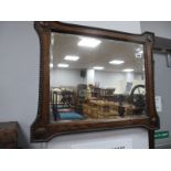 A 1920's Oak Rectangular Shaped Mirror, with beadwork decoration and bevelled glass.,