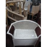 Two Wicker Patio Chairs and Table, white painted seat with linen compartment. (4)