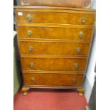 Mid XX Century Walnut Chest of Drawers, with a crossbanded top, five long drawers on cabriole legs.