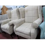A Pair of Upholstered Wing Chairs, on cabriole legs.