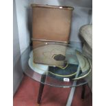 A XIX Century Hessian Covered Travelling Trunk, glass circular topped table with silvered decoration