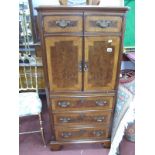 Walnut Two Door Cabinet, with three lower drawers, 63cm wide.