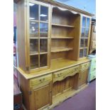Younger Pine Dresser, with twin glazed doors to shelve rack, on three drawer base, having four