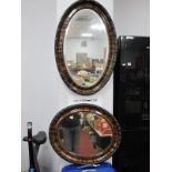 Two Early XX Century Oval Shaped Mirrors, with bevelled glass.