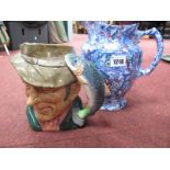 Royal Doulton Character Jugs, The Poacher D6429 and a Maling Chintz jug for Ringtons. (2)