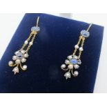 A Pair of Edwardian Style Sapphire and Pearl Set Drop Earrings, each flowerhead cluster with diamond