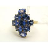 A Modern 9ct Gold Tanzanite Cluster Dress Ring, claw set throughout with oval cut stones, limited