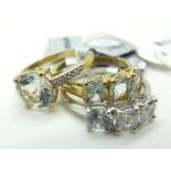 The Genuine Gemstone Company; A Modern 9ct Gold Dress Ring, claw set centre, within inset shoulders,