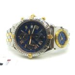 Breitling; A Bi-Metal Crosswind Automatic Gent's Wristwatch, the signed blue dial with three