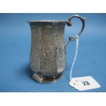 A Hallmarked Silver Mug, JE, London 1862, of octagonal baluster form, allover foliate decorated,