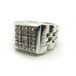 A Modern Gent's 18ct White Gold Diamond Set Dress Ring, the square panel set throughout with