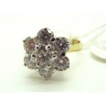 A Modern 18ct Gold Diamond Set Flowerhead Cluster Ring, claw set throughout, approximate total