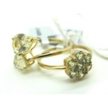 The Genuine Gemstone Company; Two Modern 9ct Gold Dress Rings, of various designs.