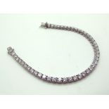 An 18ct White Gold Diamond Set Tennis Bracelet, claw set throughout with uniform brilliant cut