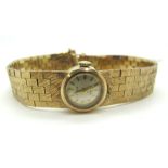 Rolex; A Vintage 9ct Gold Cased Ladies Wristwatch, the signed dial with line markers, the movement