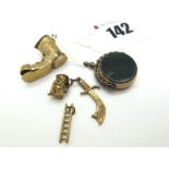 A Novelty 9ct Gold Boot Charm Pendant; A Miniature Toby Jug Charm Pendant, stamped "375"; A 9ct Gold