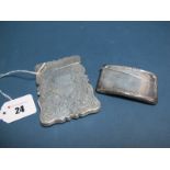 A Hallmarked Silver Card Case, (marks rubbed), Chester 1900, of shaped rectangular form, allover