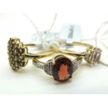 The Genuine Gemstone Company; A Modern 9ct Gold Cluster Dress Ring, claw set throughout, with