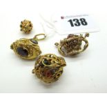 A Novelty 9ct Gold Swivel Charm Pendant, containing dice; A Garnet Set Pendant, oval collet set,