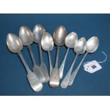 Four Hallmarked Silver Fiddle Pattern Table Spoons, (various makers and dates), one initialled;