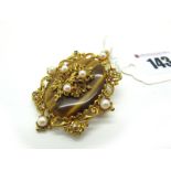 A Large 9ct Gold Tiger's Eye and Pearl Set Pendant/Brooch, of shaped oval openwork design, with