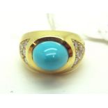 A Modern Turquoise and Diamond Set Dress Ring, high oval cabochon set to the centre, between pave